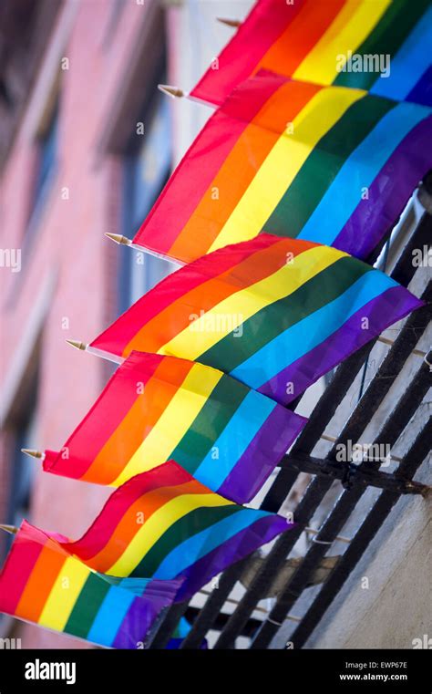 Gay Pride Rainbow Flags Hanging From Traditional New York City Fire