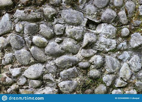Old Concrete Stone Wall Overgrown With Moss Wall Texture Stock Photo