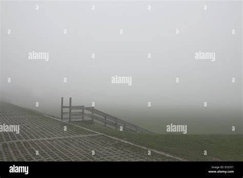 Wooden Stairway And Earth Mound In Mist Stock Photo Alamy