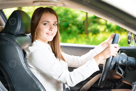 Beautiful Woman Sitting In Car Stock Photo At Vecteezy