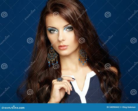 Portrait Of Beautiful Brunette Woman With Earring Perfect Makeup Stock