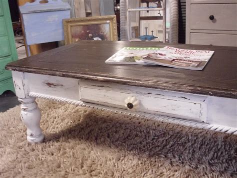 This beautiful coffee table has been made from reclaimed wood and measures 40l x 22w x 17.5h and has been stained, painted and and treated with poly for its utmost protection. grace upon grace al: Distressed Coffee Table