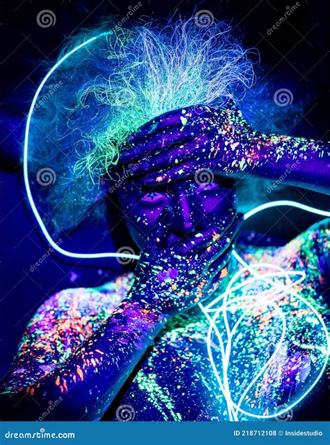 Body Art And Contact Lenses Glowing In Ultraviolet Light Portrait Of A