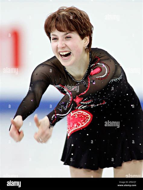 Ladies Gold Medalist Irina Slutskaya From Russia Gives A Double Thumbs