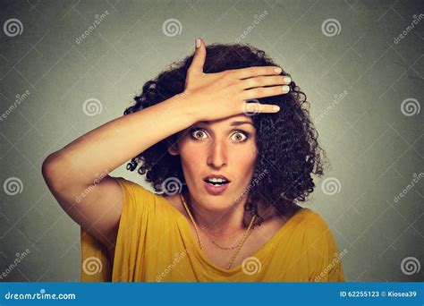 Concerned Scared Woman With Hand On Forehead Gesture Stock Image
