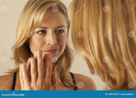 Woman Touching Mirror While Looking At Reflection Stock Image Image Of Female Looking 16897433