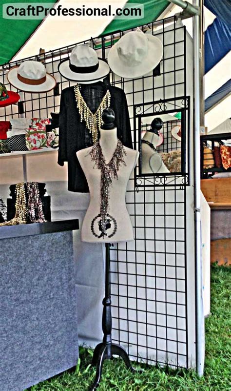 Hang a sign holder right above your products to easily provide information. Gridwall Display Booth Photos