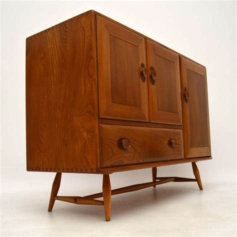 Preowned ercol tables, chairs, living and dining room furniture in traditional oak, ash and walnut finishes. 1960's Vintage Ercol Sideboard in Solid Elm ...