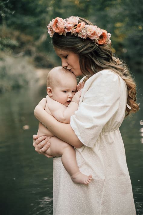 An Intimate Breastfeeding Session In The Creek The Bond Between Mother