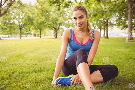 Portrait Of Smiling Woman With Legs Crossed Stock Image Image Of