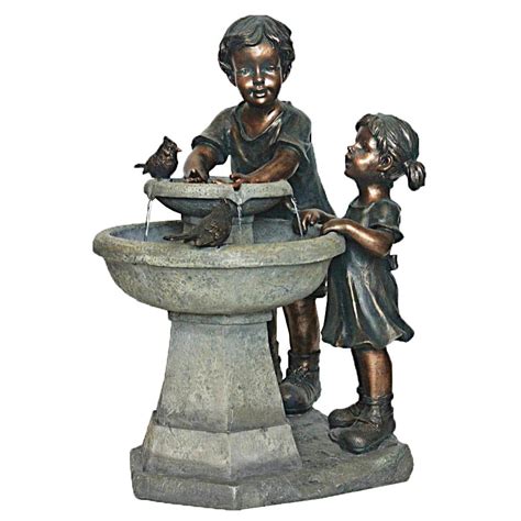 Fountains may be blended in with the surrounding garden in a natural way. Shop Garden Treasures 27.2-in Resin Statue Fountain at ...