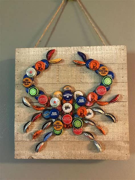 The taste was truly authentic. Beer cap crab | Bottle cap crafts, Beer bottle crafts ...