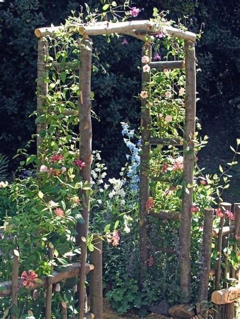 Rustic Garden Arbor Made With Natural Wood With Climbing Flowers Arbor