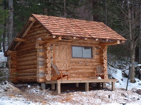 This design is highly practical, because the interior space above the porch makes a natural loft space where the kids can have a small bedroom, or you can create a lovely reading nook. Adirondack Cabin
