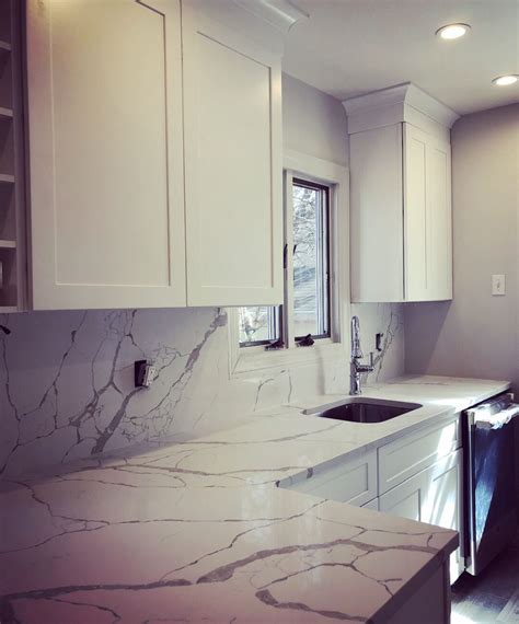 I would like to know what should be installed first, the granite countertops or the tile backsplash and why. Full height Calacatta Laza backsplashes and white shaker ...