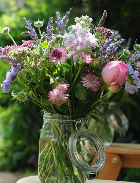 Those seeking something out of the ordinary can opt for the flowers to come in a mason jar (from $100) or a vintage enamel mug ($95). spriggs florist: kilner jars & english summer flowers