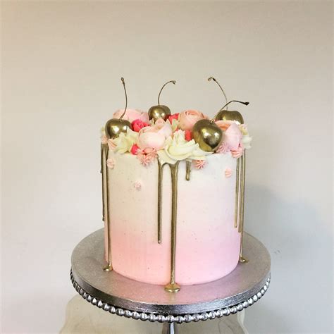 Gold Drip Pink Ombré Cake With Gilded Cherries And Buttercream Flowers