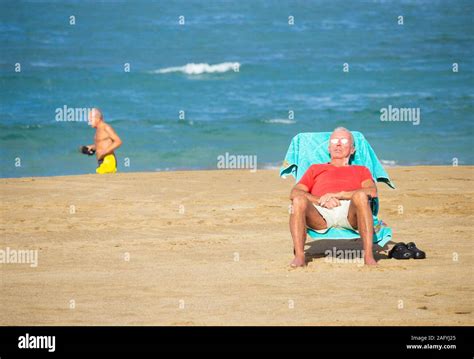 Old Man Sunbathing On Beach Hi Res Stock Photography And Images Alamy