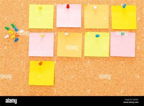 Post It Reminder Sticker Note With Pins On Board Stock Photo Alamy