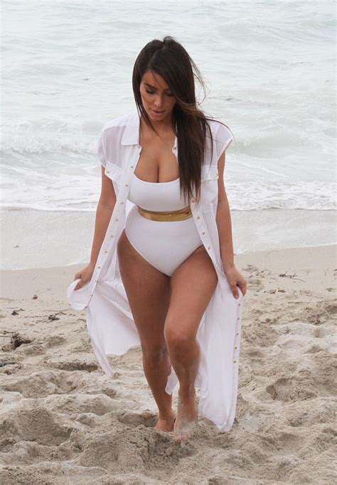 Kim Kardashian In White One Piece Swimsuit On The Beach In Miami