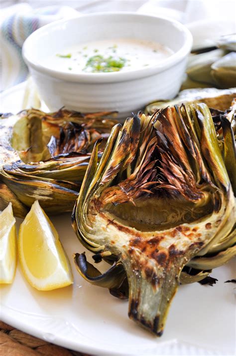 Jul 21, 2015 · artichokes are delicious, but a lot of folks have no idea how to choose a good artichoke, trim it properly, cook it, and eat it! Grilled Artichoke with Zesty Garlic Aioli - California ...