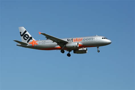 Jetstar Plane Flight Under Blue Sky · Free Stock Photo