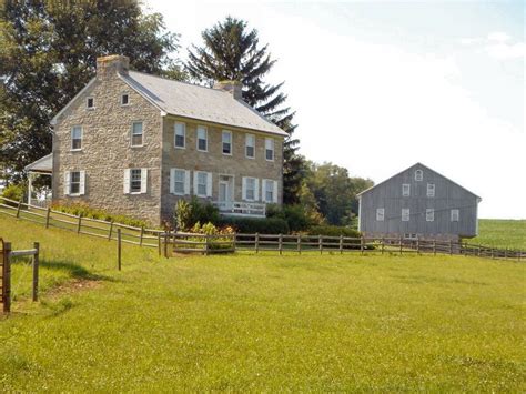 A Pennsylvania Farmhouse In A Pasture Of Beautiful Green