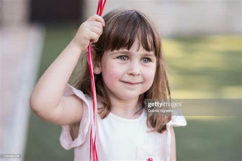 Portrait Of An Adorable Little Girl Having Fun High Res Stock Photo