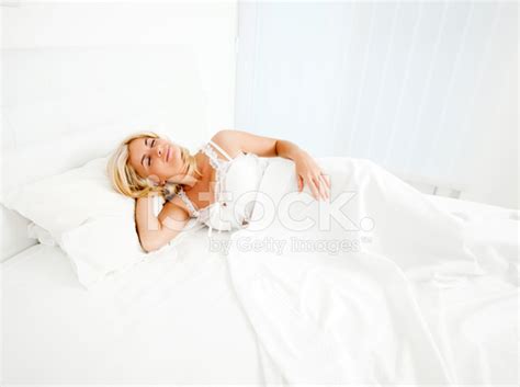 Beautiful Blonde Woman Sleeping In Her Bed Stock Photo Royalty Free