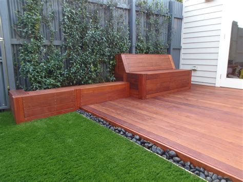 A lawn is of course lovely, but patios provide a good spot for an outdoor seating area. Small court yard brought to life with Merbau decking, a ...
