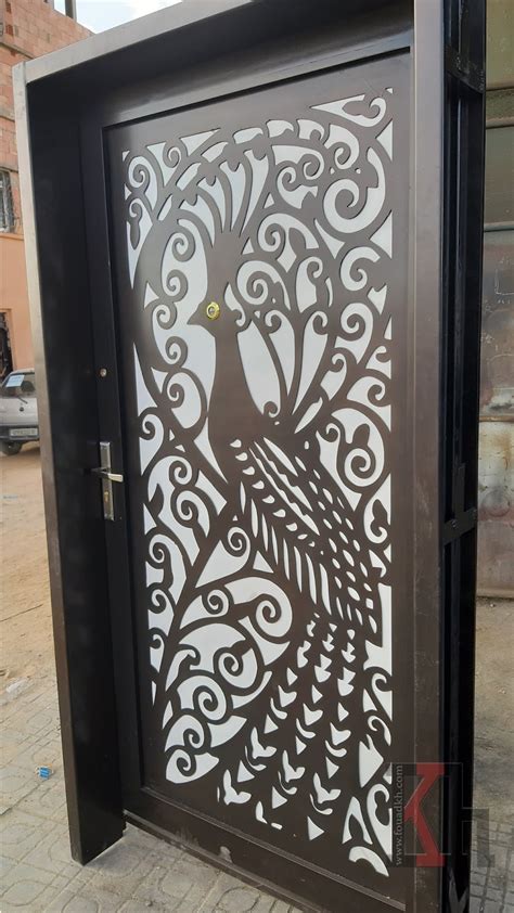 A decorative gate, part of blacksmith artwork illustration series. صورأبواب بلازمة cnc - فن زخرفة Fer forgé
