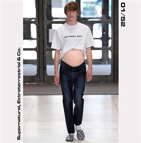 men s fashion week male models appear on runway with pregnancy bumps