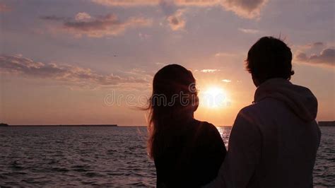 Couple Silhouette At The Beach Sunset Light Kissing Stock Video