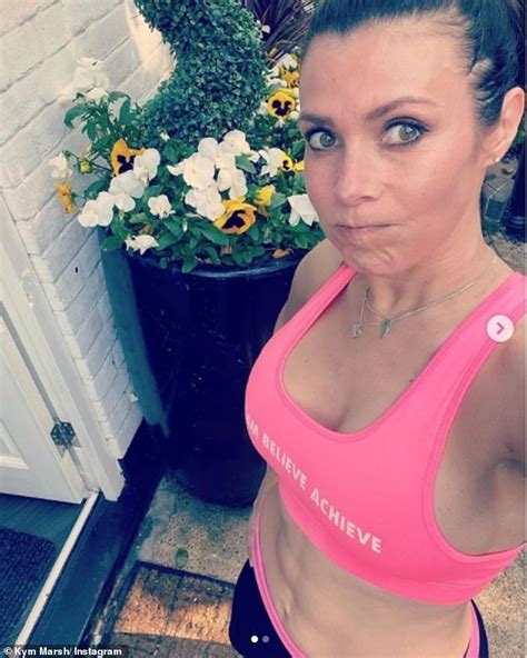 Kym Marsh Shows Off Her Rippling Abs In A Pink Sports Bra And Leggings