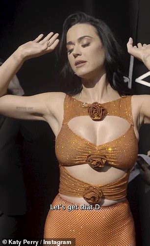 Katy Perry Stuns As She Shows Skin In A Se Y Sheer Orange Number With