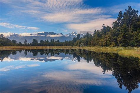 Lake Matheson With Mountains Reflection In The Water New Zealand Stock