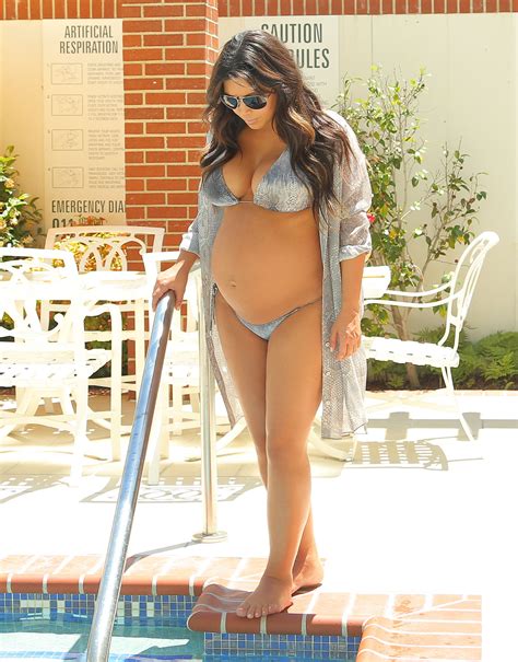 Kim Kardashian Showed Off Her Baby Bump In A Bikini Just Five Days