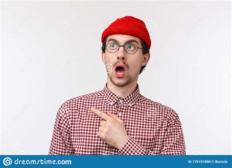 Close Up Portrait Amazed And Speechless Funny Caucasian Man With Beard In Glasses And Red