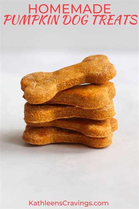Homemade Pumpkin Dog Treats Stacked On Top Of Each Other