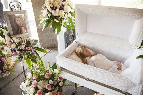 This video shows beautiful women in their funeral caskets! Liana Kotsura in her open casket during her funeral. (With ...