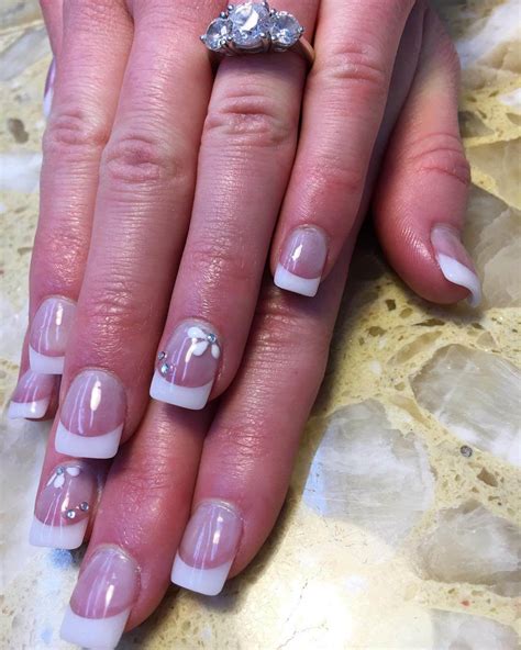 French Tip Nails With Flowers - 10 Radiant Nail Designs For Ring Finger ...