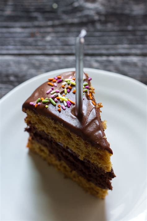 triple layer chocolate vanilla birthday cake with chocolate cashew