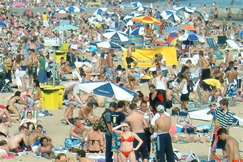 beach crowd beach times square crowd