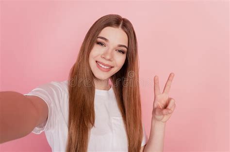 Photo Of Young Woman Showing Two Fingers Victory Gesture Make Selfie On