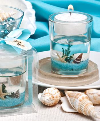 This box includes beach rope border on the lid and features lightly glittered starfish. Stunning beach-themed candle favor
