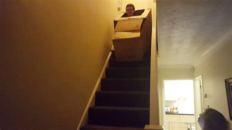 Riding Cardboard Box Down Stairs Youtube
