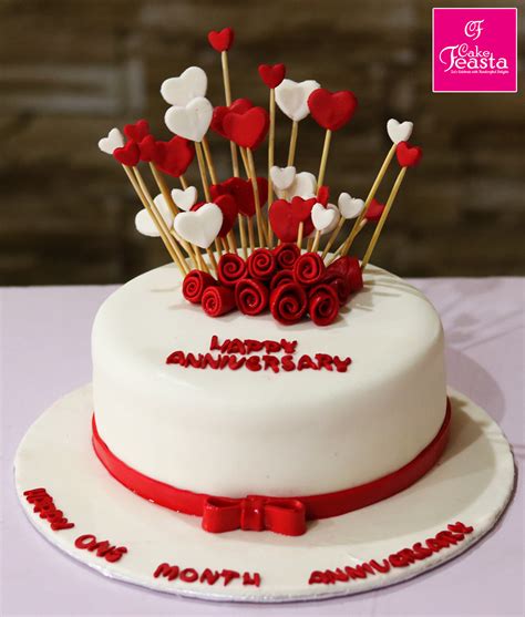 The online website is chocholik and i personally recommend this website to you. Heart Flowers Theme Anniversary Cake - anniversary cake