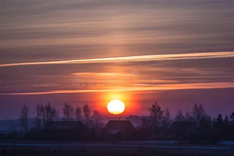 Sunset In A Cold Winter Evening Over A Meadow Stock Image Image Of