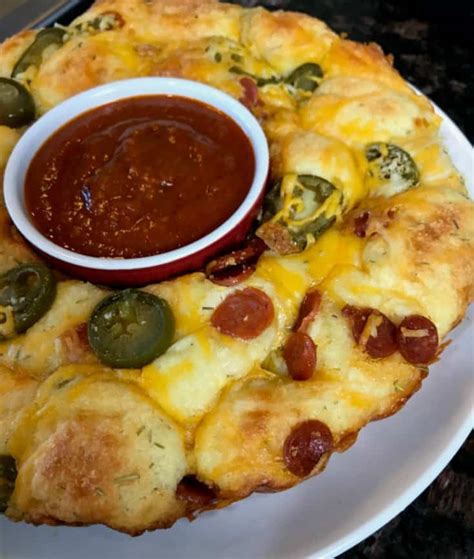 Our pull apart pizza bread is so easy to make and delicious. The BEST Keto Pull Apart Pizza Bread Recipe - iSaveA2Z.com