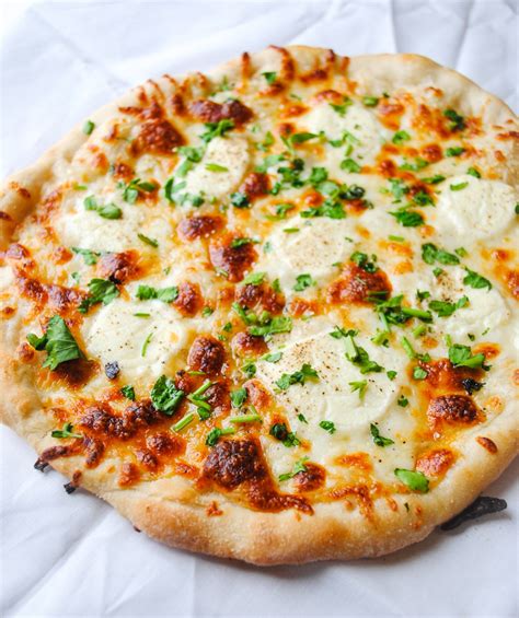 Wondering what the white chunks in stools are? white sauce pizza with ricotta cheese